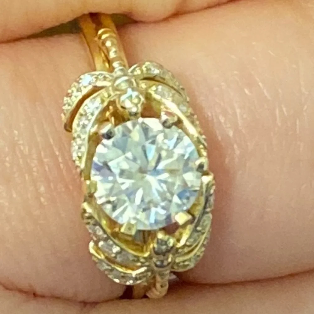 10kt yellow gold and moissanite dragonfly ring.
